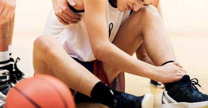 Keep Sports Injuries on the Bench with Chiropractic Care image